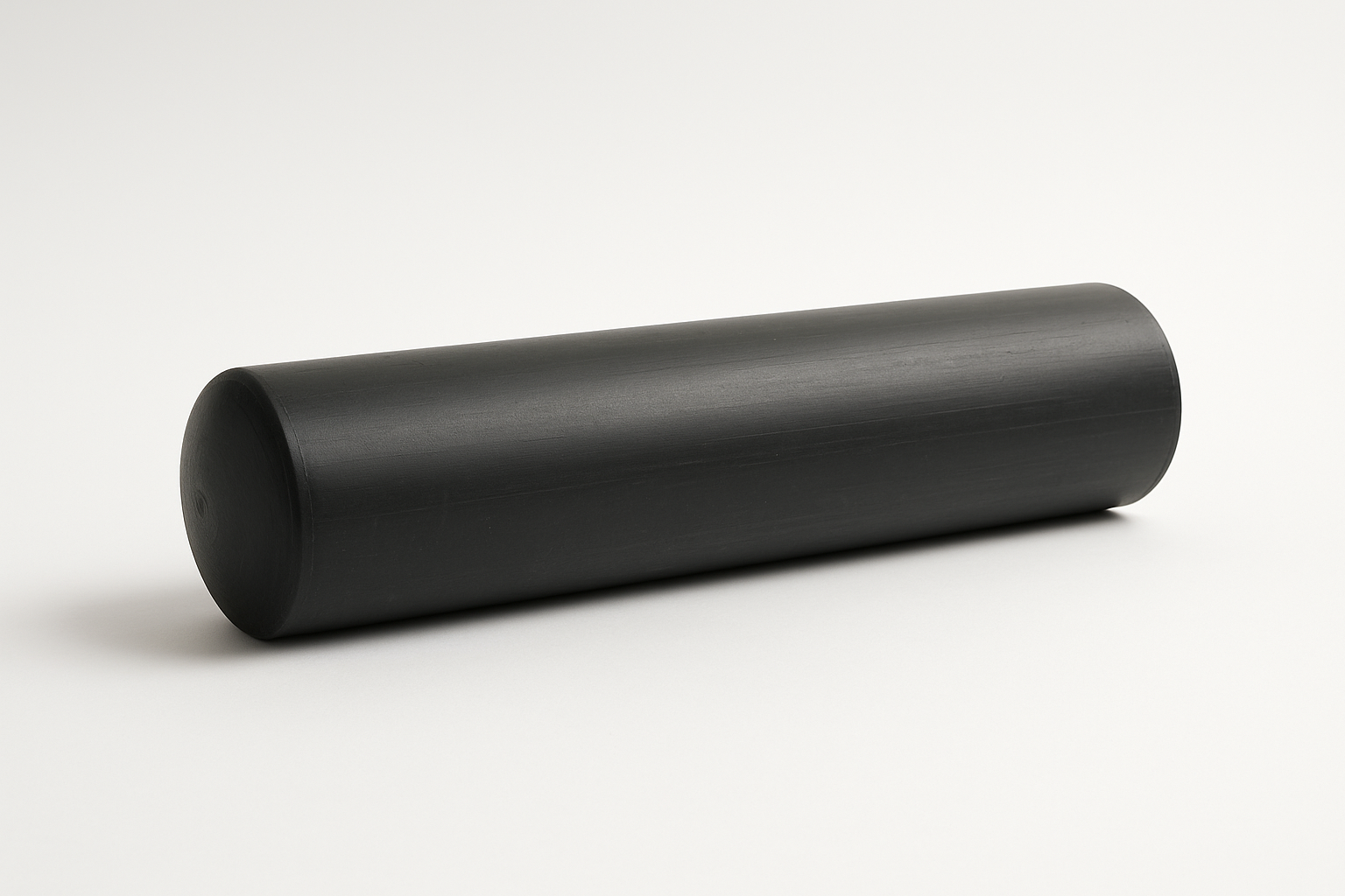 2-foot pvc pipe that laying on its side and its color black